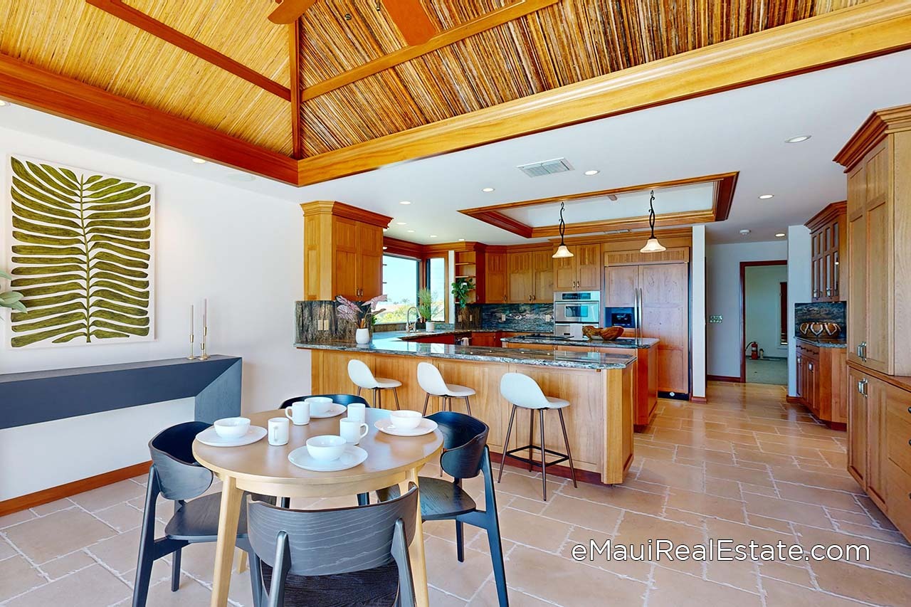 Example of a kitchen with dining area in a custom Golf Estates home on Pahi Place